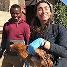 students learning poultry-handling techniques