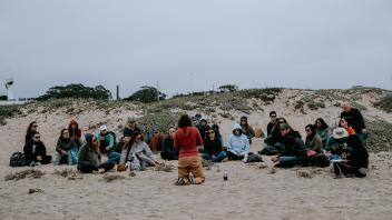Rx One Health course participants on the beach