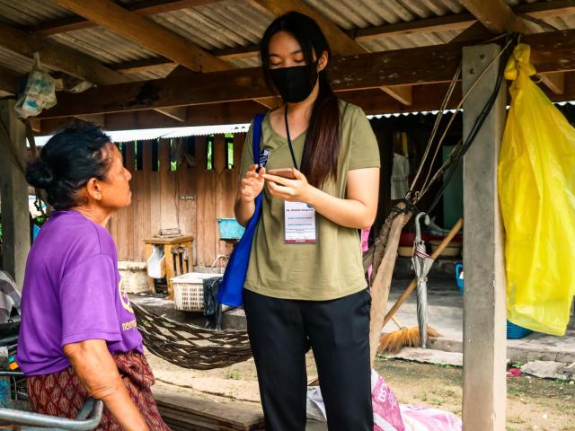 THOHUN student interviewing a community member